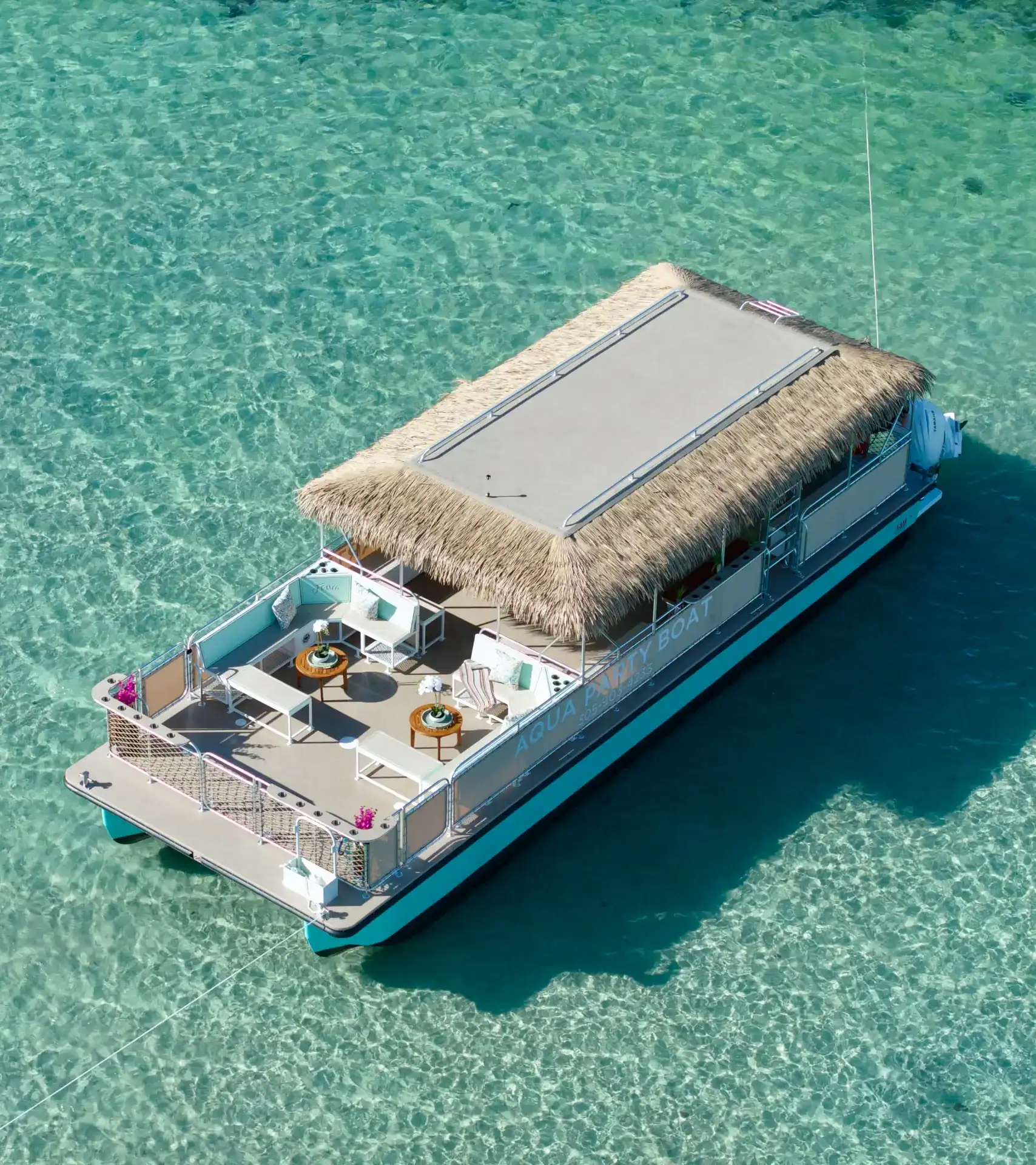 Aqua Party Boat Miami Tipsea vessel with passengers enjoying a sandbar party with balloons and floats